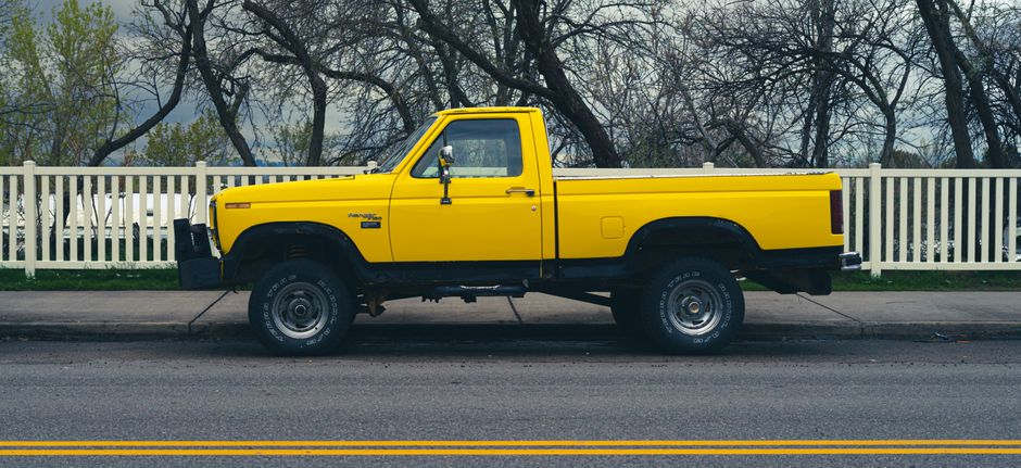 A pickup truck parked on a residential street