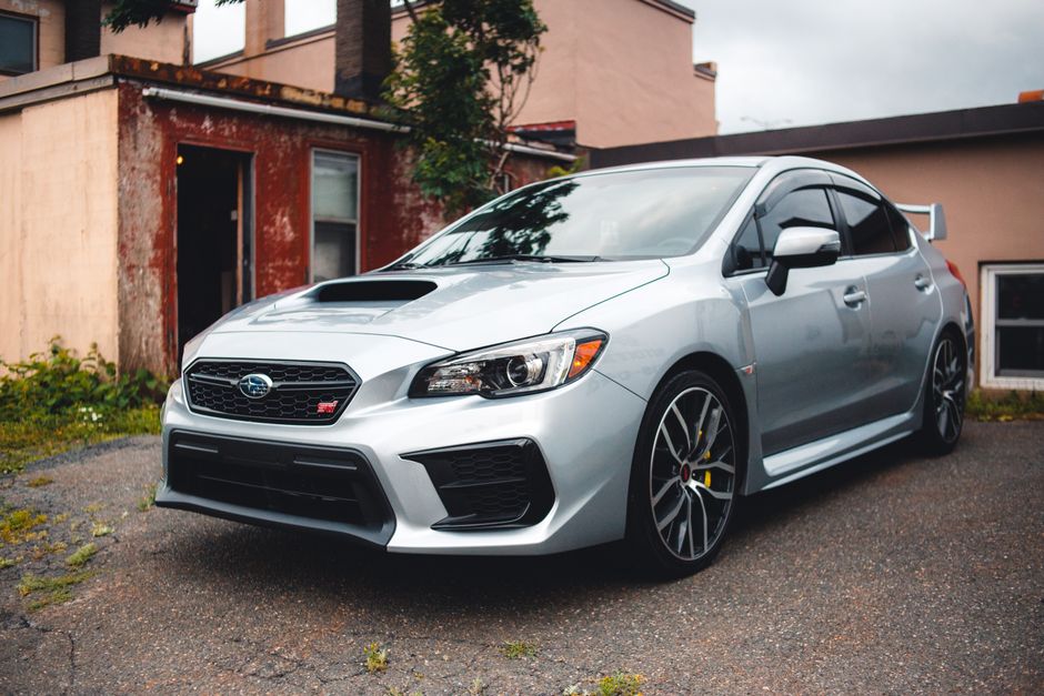 A sedan parked outside